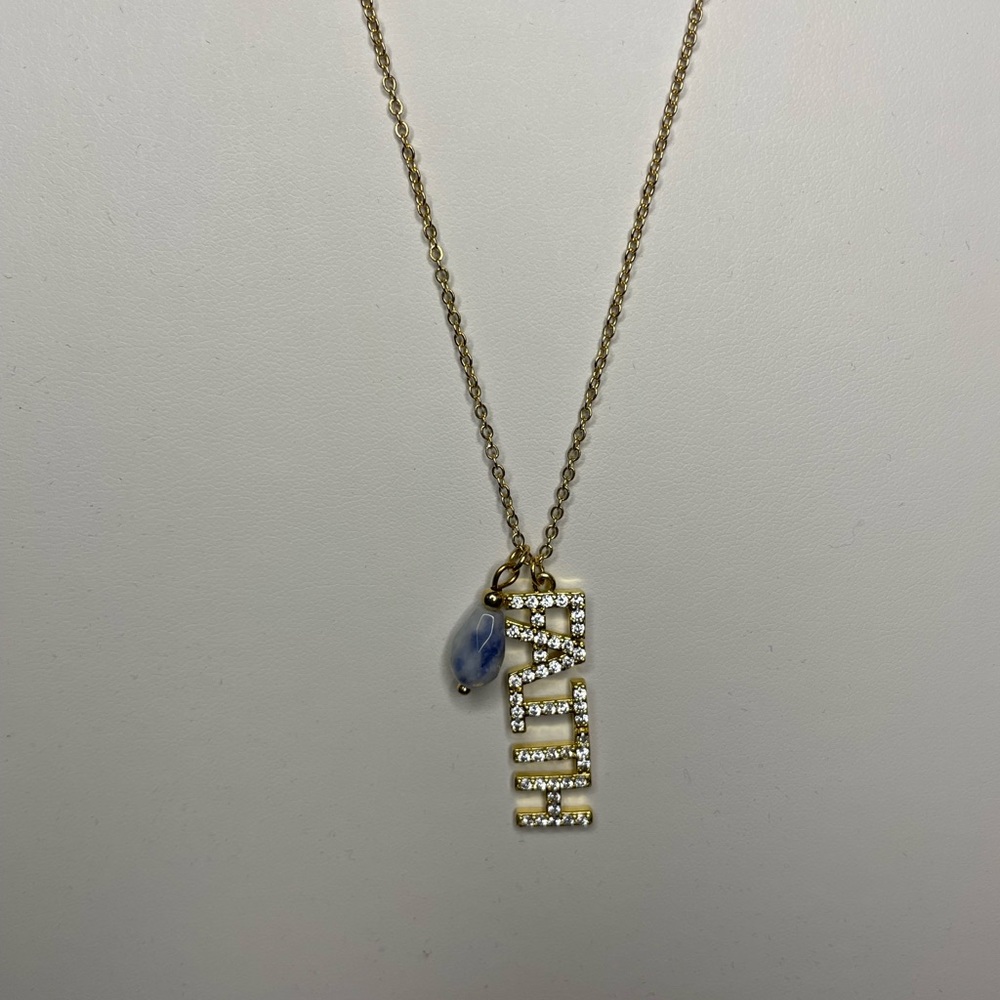 Gold “faith” necklace